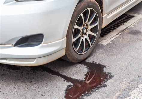 car is leaking red fluid|Red Fluid Leaking From a Car – Explained